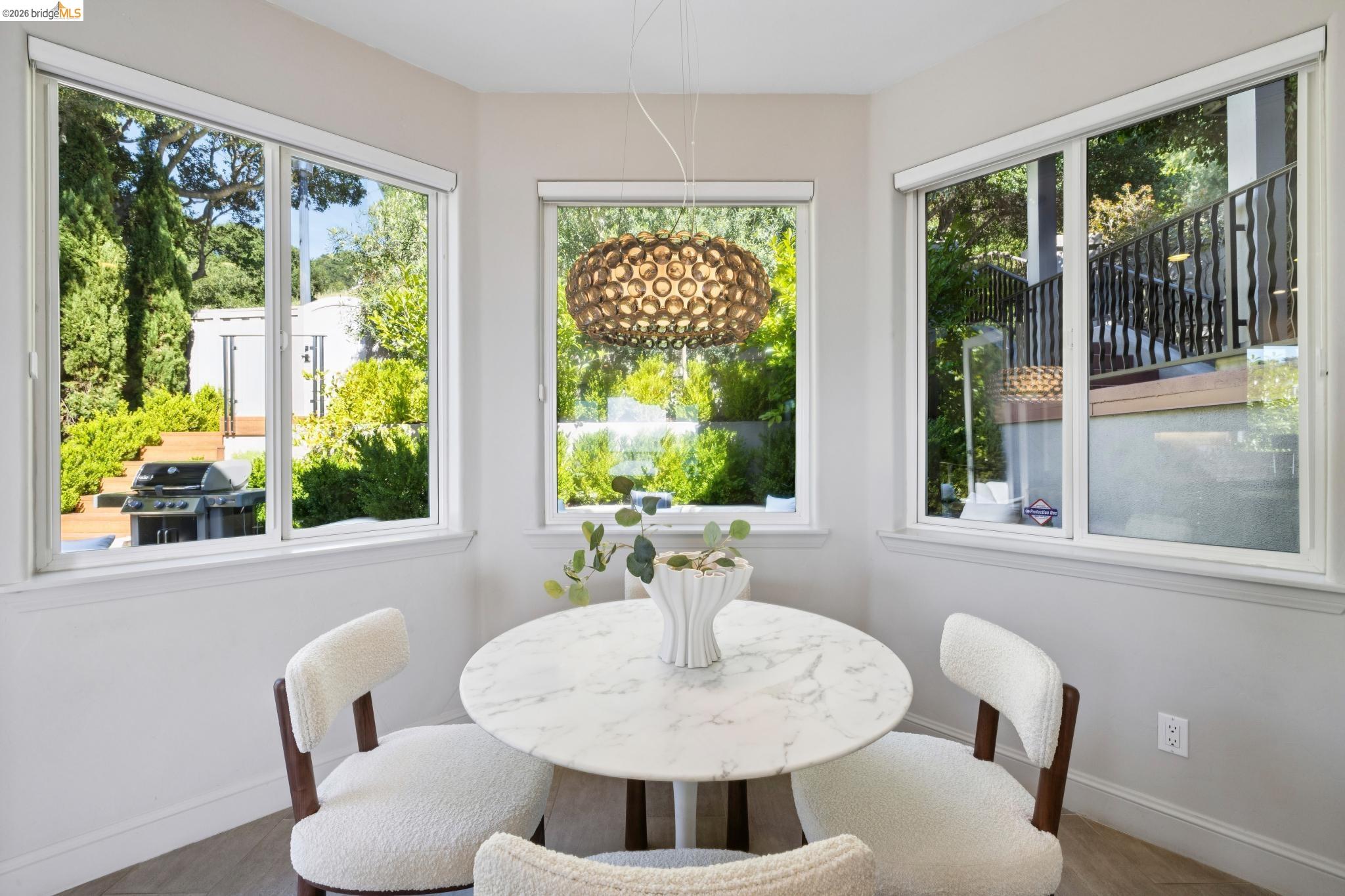 1426 Grand View Drive Berkeley, CA 94705 - Photo 26 of 55 Eat-in kitchen next to outdoor patio area