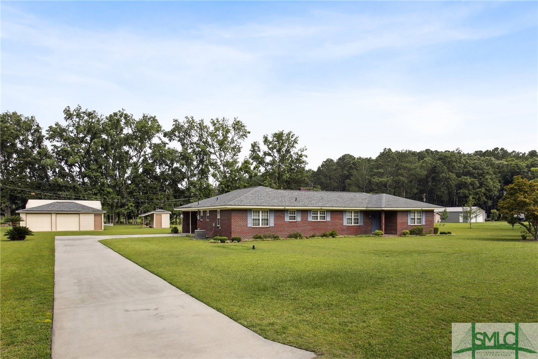 219 George Road Bloomingdale, GA 31302 - Photo 1 of 36 One-Owner FULL BRICK Custom Home