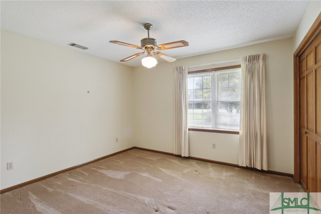 219 George Road Bloomingdale, GA 31302 - Photo 19 of 36 2nd bedroom with fan