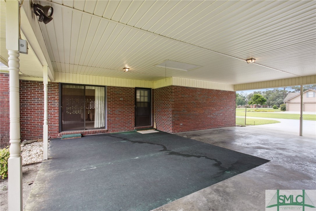 219 George Road Bloomingdale, GA 31302 - Photo 23 of 36 Oversized carport