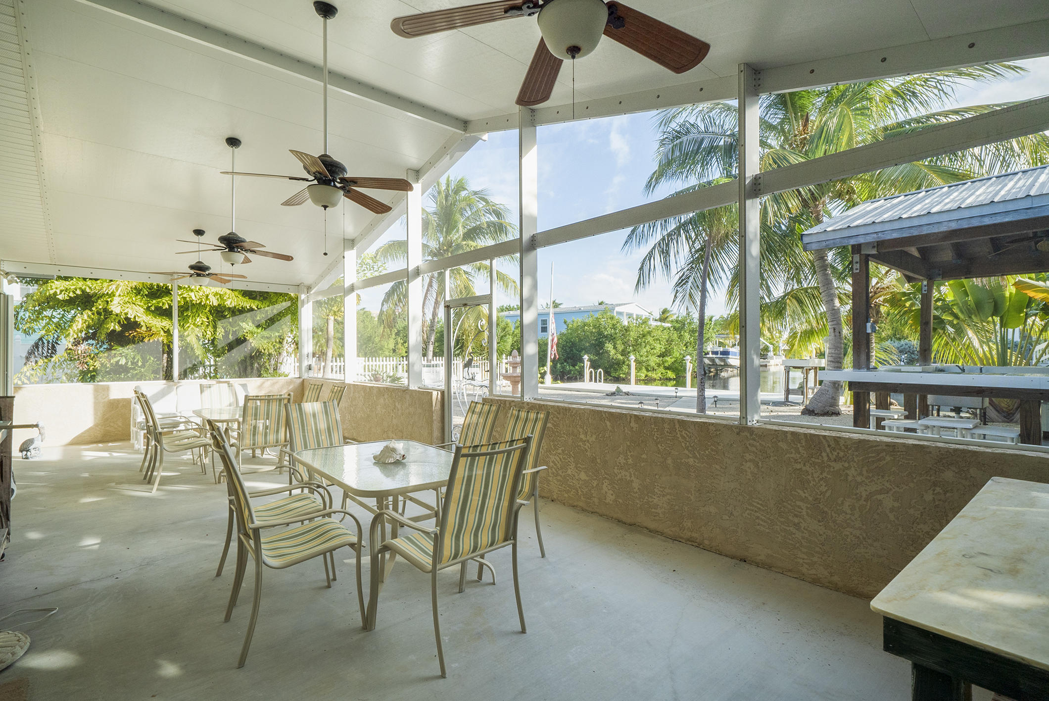 28300 County Road Summerland Key, FL 33042 - Photo 26 of 34 Canal-side screened porch 2