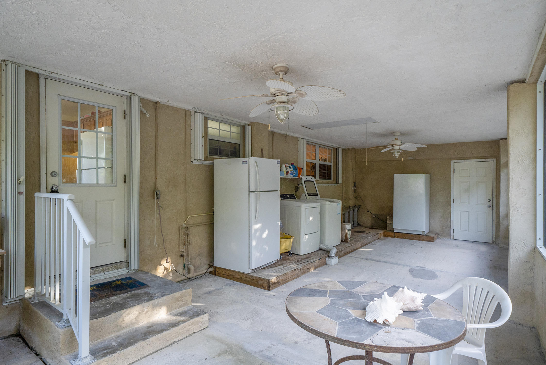 28300 County Road Summerland Key, FL 33042 - Photo 28 of 34 Side screened porch 1, kitchen entry