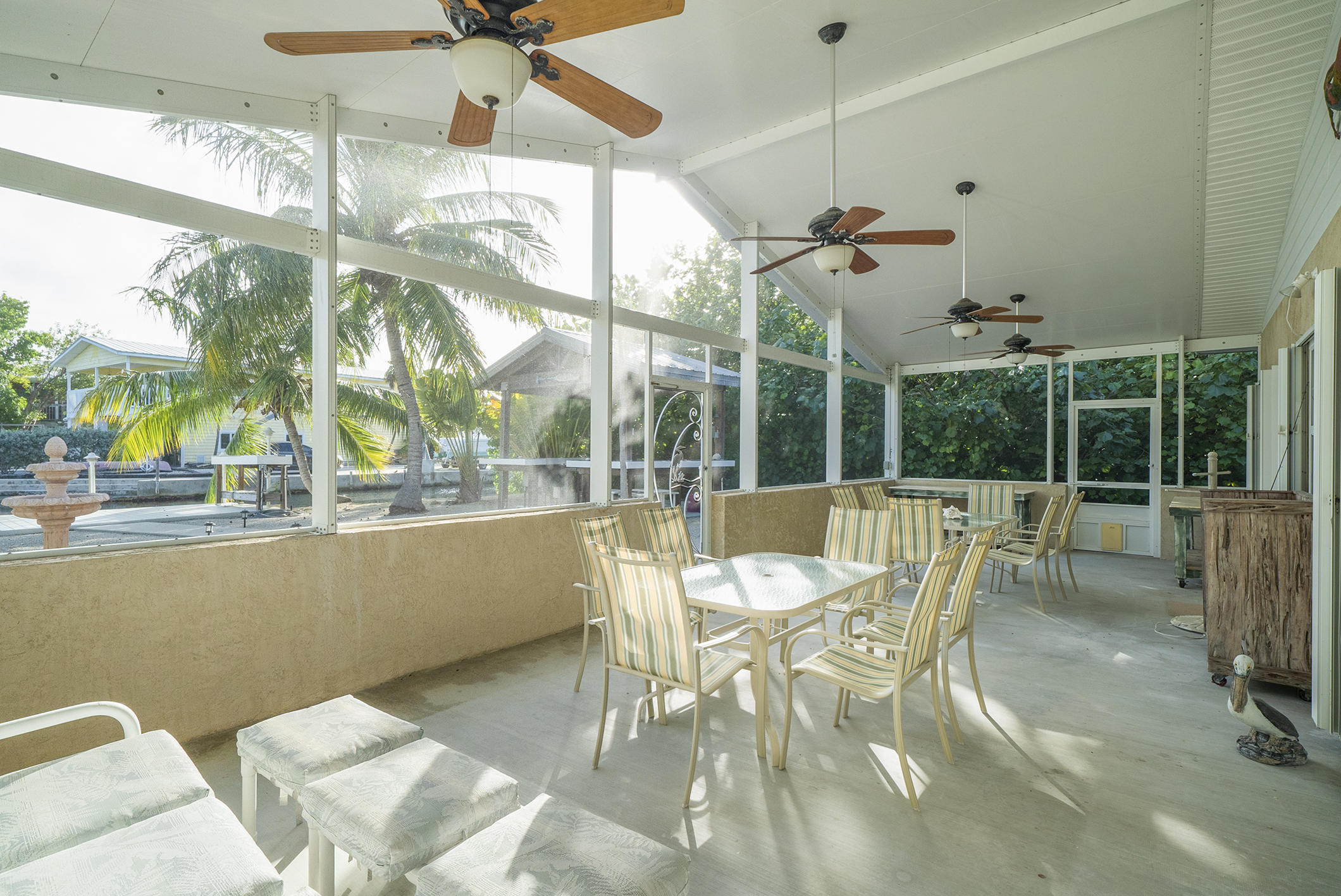28300 County Road Summerland Key, FL 33042 - Photo 10 of 34 Canal-side screened porch 1