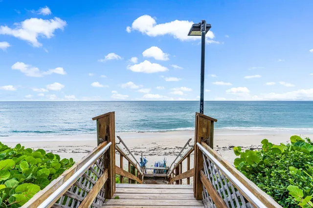 a view of a balcony with an ocean