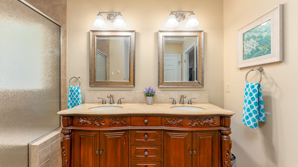 4420 Reese Road, Unit 1D Columbus, GA 31907 - Photo 11 of 17 a bathroom with a sink and a mirror