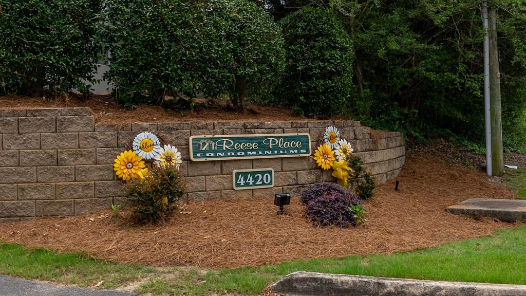 4420 Reese Road, Unit 1D Columbus, GA 31907 - Photo 17 of 17 a sign that is sitting in the middle of a yard
