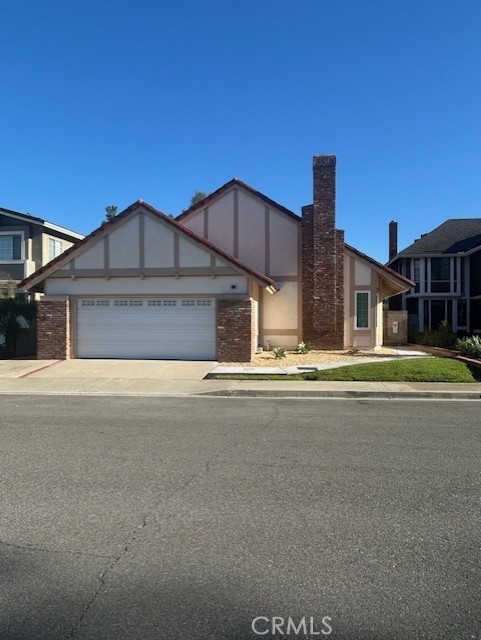 Front yard with new concrete sidewalk