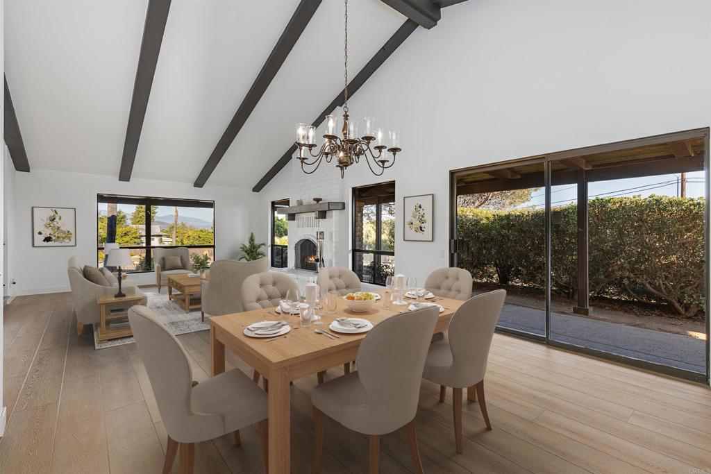 112 Palmas Norte Fallbrook, CA 92028 - Photo 15 of 74 a view of a dining room with furniture wooden floor and chandelier