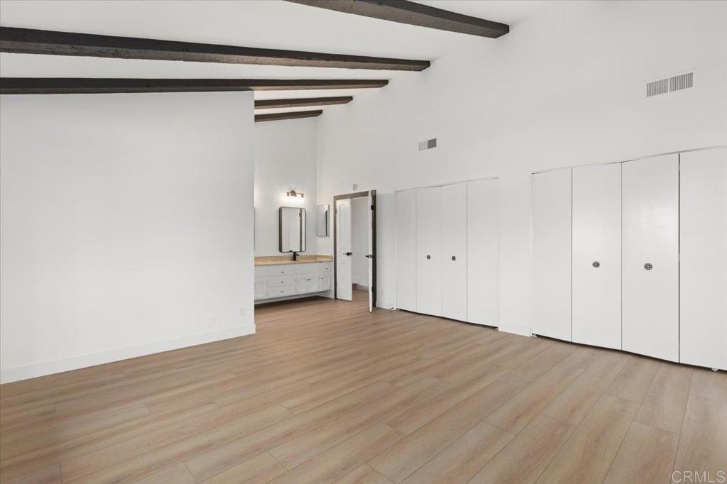 112 Palmas Norte Fallbrook, CA 92028 - Photo 32 of 74 a view of empty room with wooden floor