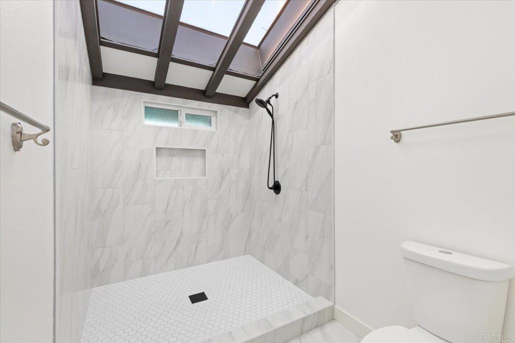 112 Palmas Norte Fallbrook, CA 92028 - Photo 36 of 74 a bathroom with a shower and a toilet