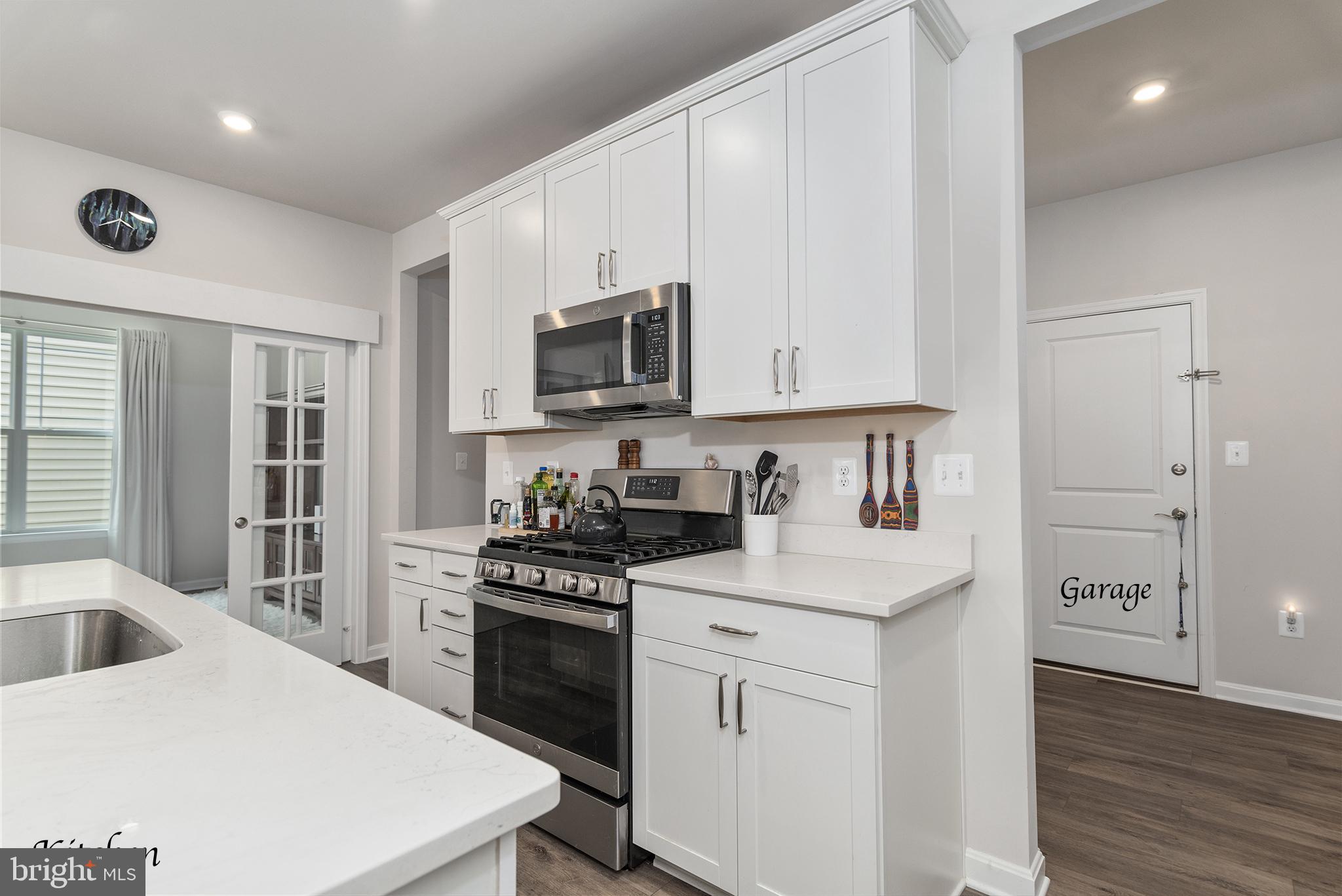 505 Cherry Bark Road Middletown, DE 19709 - Photo 13 of 59 Around the corner Garage/Pantry and Laundry