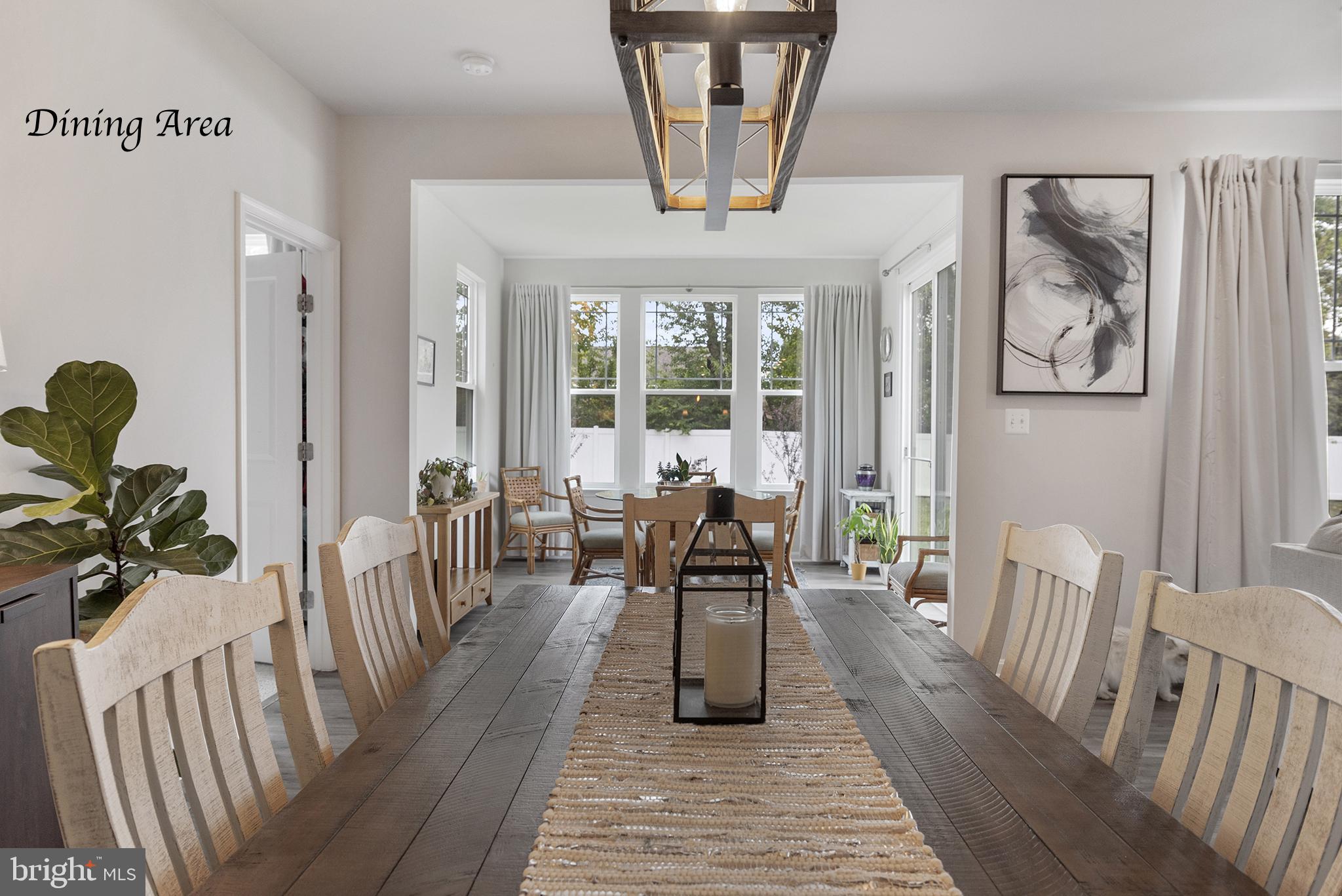 505 Cherry Bark Road Middletown, DE 19709 - Photo 19 of 59 Dining Area into The Sunroom