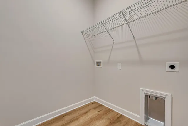 a view of a room with racks on the wall