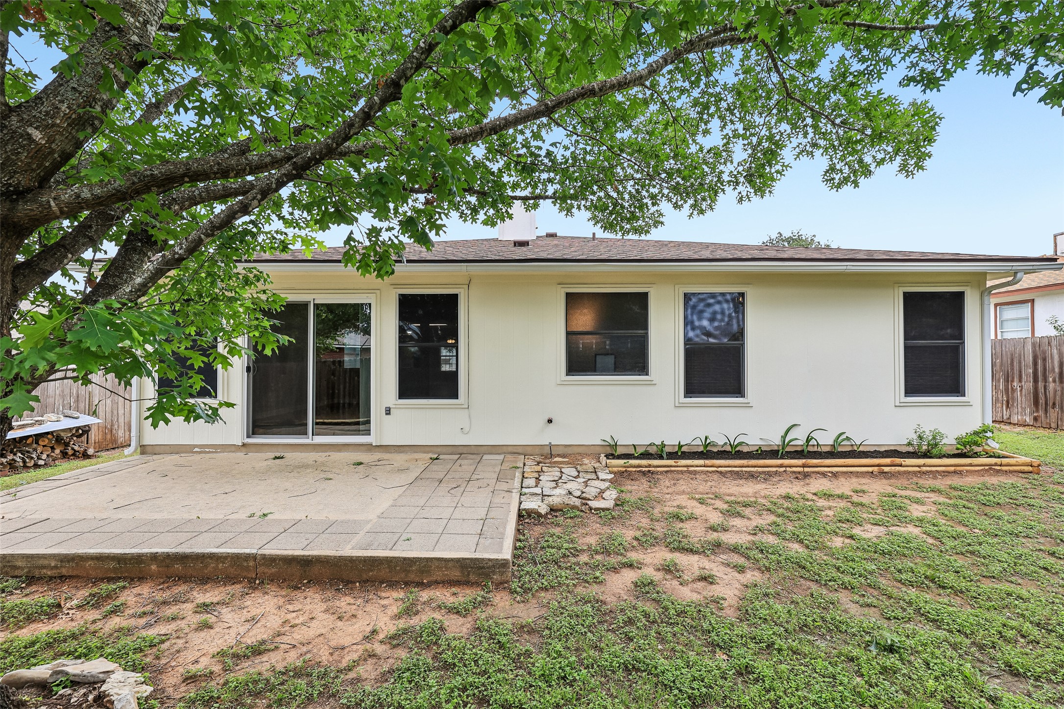 152 Grant Way Kyle, TX 78640 - Photo 36 of 39 a front view of a house with a yard