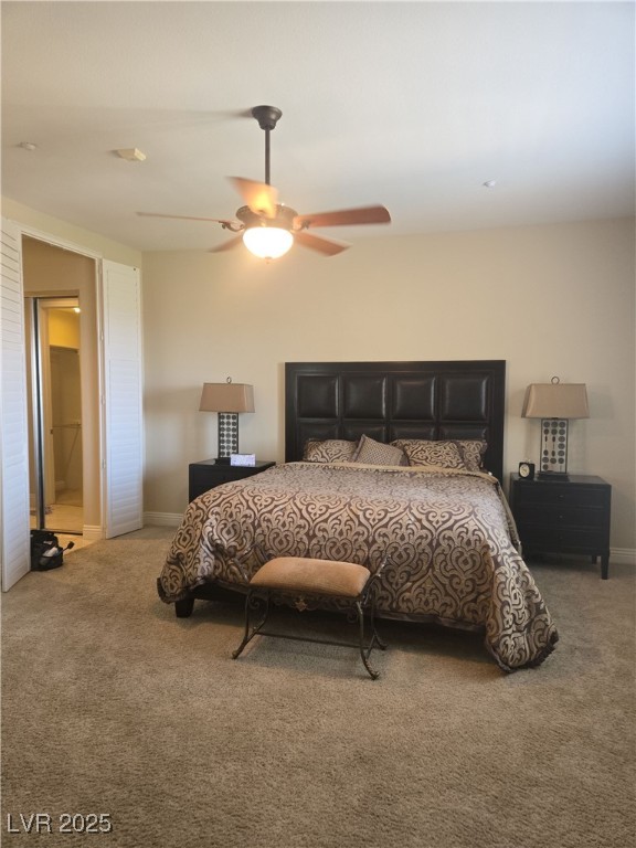 20 Via Mantova, Unit 202 Henderson, NV 89011 - Photo 17 of 60 Carpeted bedroom featuring baseboards and ceiling fan