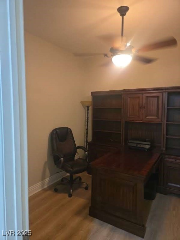 20 Via Mantova, Unit 202 Henderson, NV 89011 - Photo 21 of 60 Home office with light wood finished floors and a ceiling fan