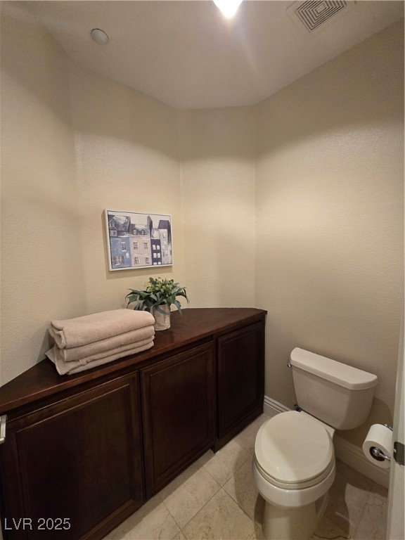 20 Via Mantova, Unit 202 Henderson, NV 89011 - Photo 45 of 60 Half bathroom featuring toilet