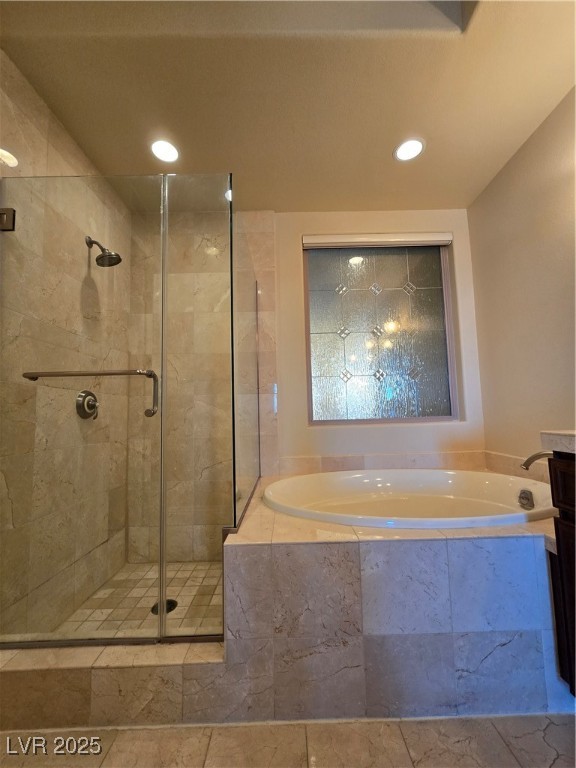 20 Via Mantova, Unit 202 Henderson, NV 89011 - Photo 46 of 60 Full bath featuring a stall shower, a bath, and recessed lighting