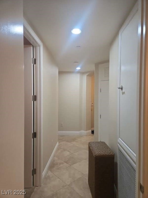 20 Via Mantova, Unit 202 Henderson, NV 89011 - Photo 52 of 60 Hallway with recessed lighting and light tile patterned floors