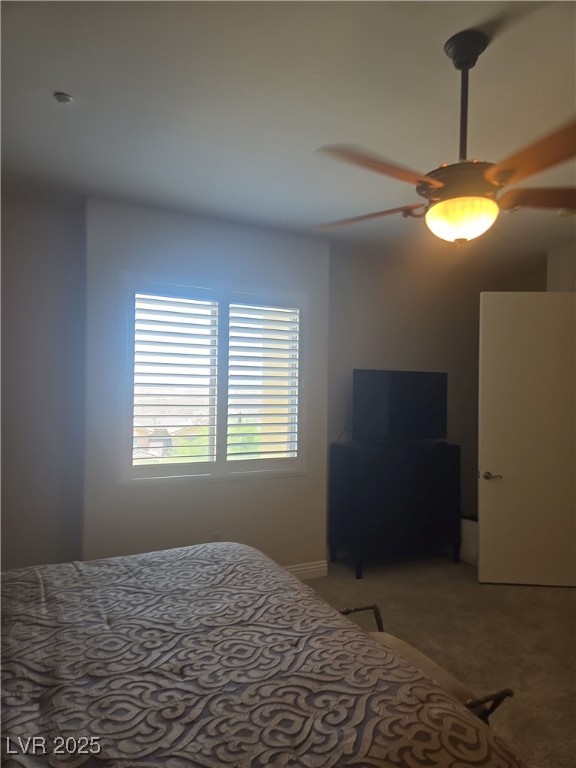 20 Via Mantova, Unit 202 Henderson, NV 89011 - Photo 54 of 60 Bedroom with light carpet and ceiling fan