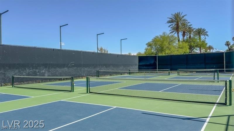 20 Via Mantova, Unit 202 Henderson, NV 89011 - Photo 56 of 60 View of tennis court featuring community basketball court