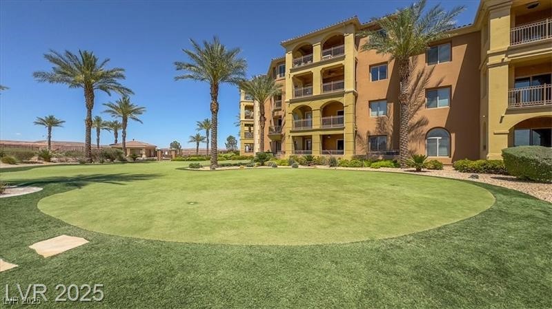 20 Via Mantova, Unit 202 Henderson, NV 89011 - Photo 57 of 60 View of home's community featuring a putting green