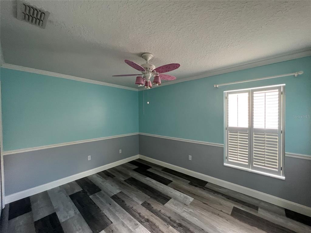 2570 Wild Tamarind Boulevard Orlando, FL 32828 - Photo 11 of 20 a room with window