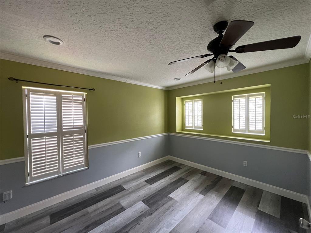 2570 Wild Tamarind Boulevard Orlando, FL 32828 - Photo 19 of 20 a view of room with window and ceiling fan