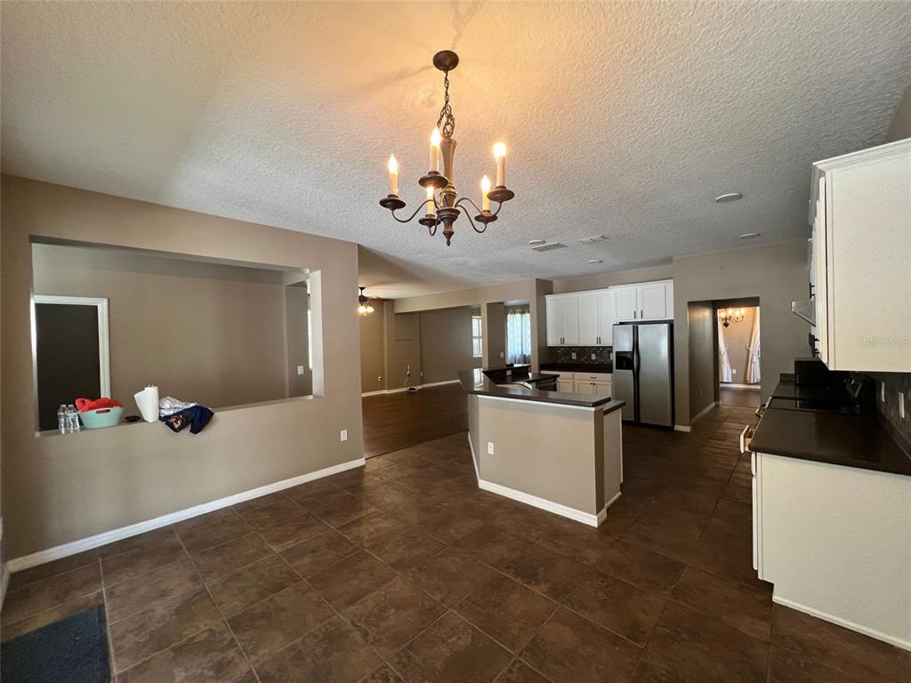 2570 Wild Tamarind Boulevard Orlando, FL 32828 - Photo 7 of 20 a view of a kitchen and a sink