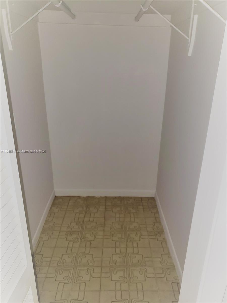 2140 Southwest 25th Street, Unit A Miami, FL 33133 - Photo 7 of 8 a view of hallway with window