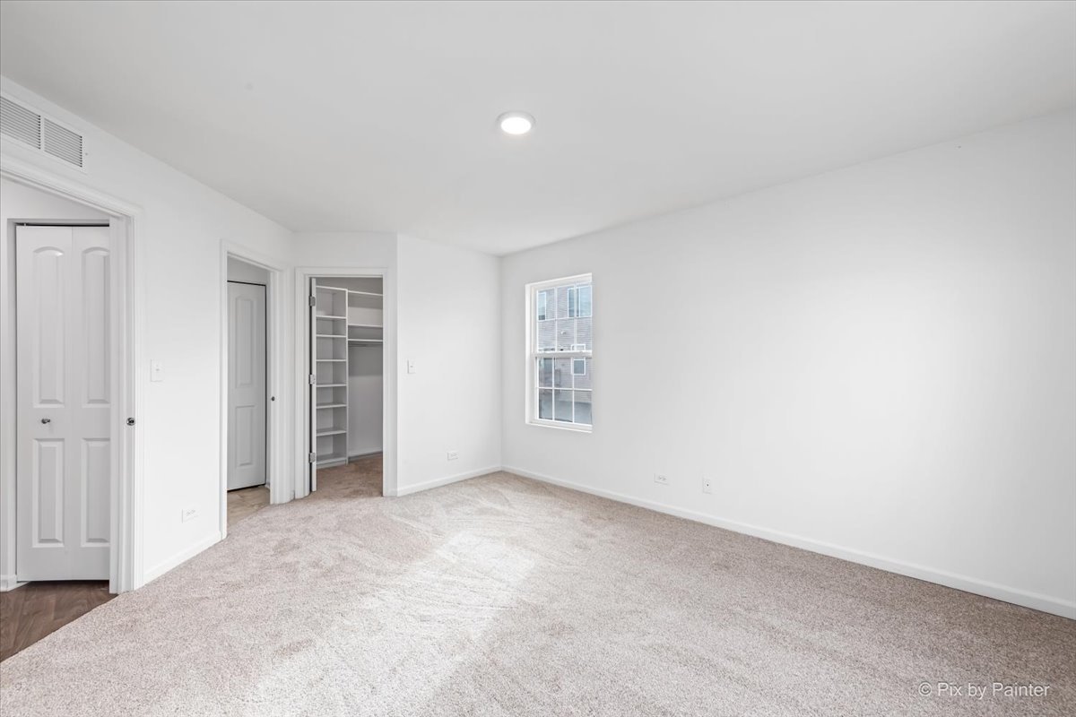 2375 Upland Road Pingree Grove, IL 60140 - Photo 11 of 32 an empty room with windows