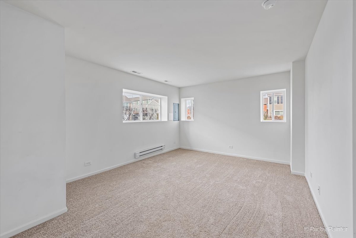 2375 Upland Road Pingree Grove, IL 60140 - Photo 16 of 32 an empty room with windows