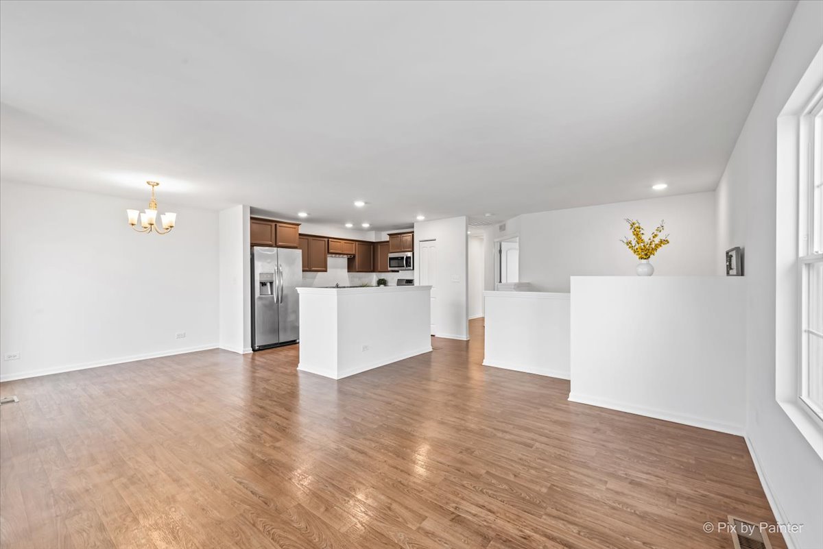 2375 Upland Road Pingree Grove, IL 60140 - Photo 7 of 32 a view of kitchen with wooden floor