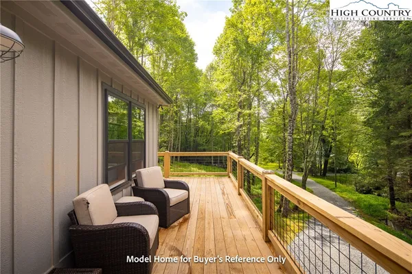 a view of balcony with couch and outdoor seating
