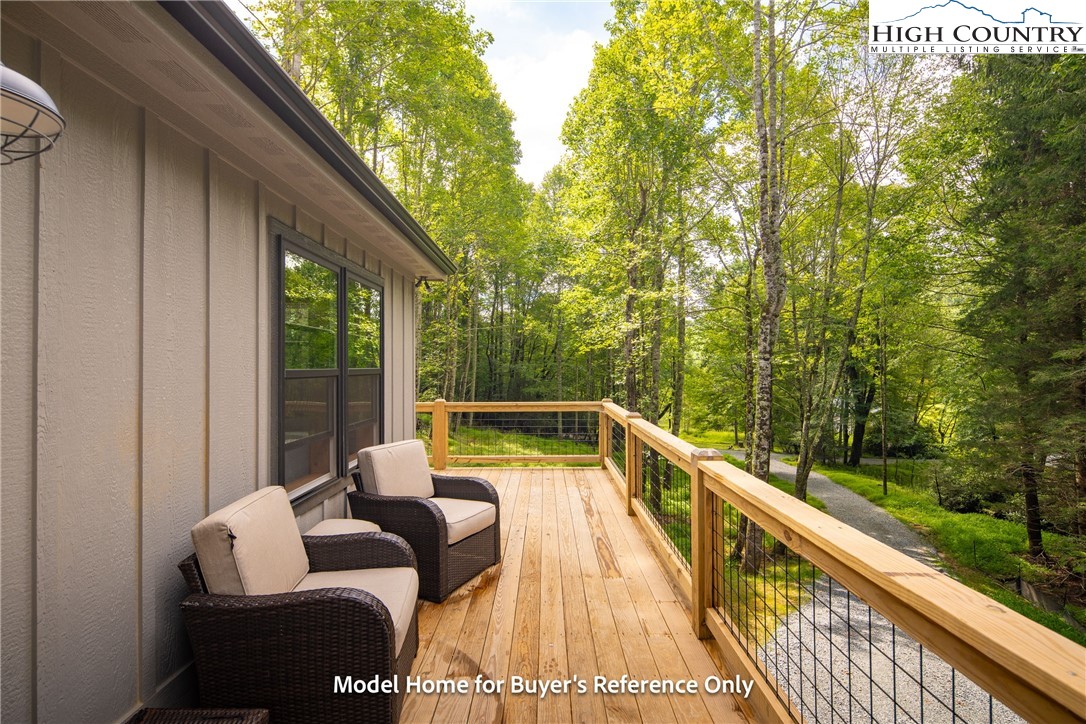 490 Laurelwood Lane Boone, NC 28607 - Photo 16 of 50 a view of balcony with couch and outdoor seating