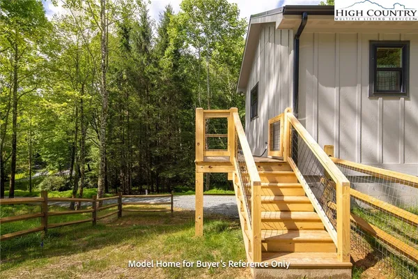 a view of swimming pool with a yard