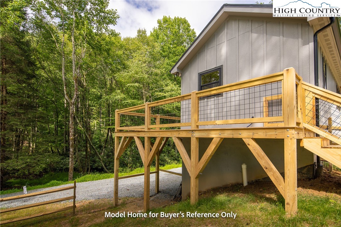 490 Laurelwood Lane Boone, NC 28607 - Photo 21 of 50 a view of a house with backyard