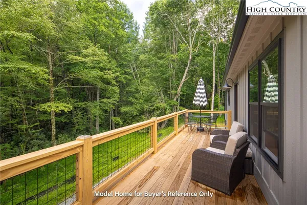 a view of balcony with furniture