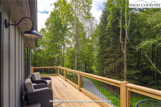a view of balcony with furniture
