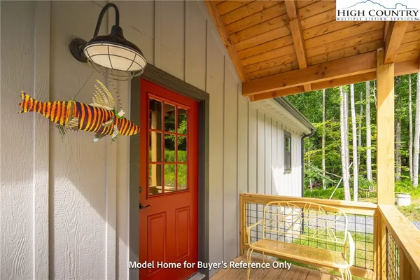 a bathroom with a mirror and a window