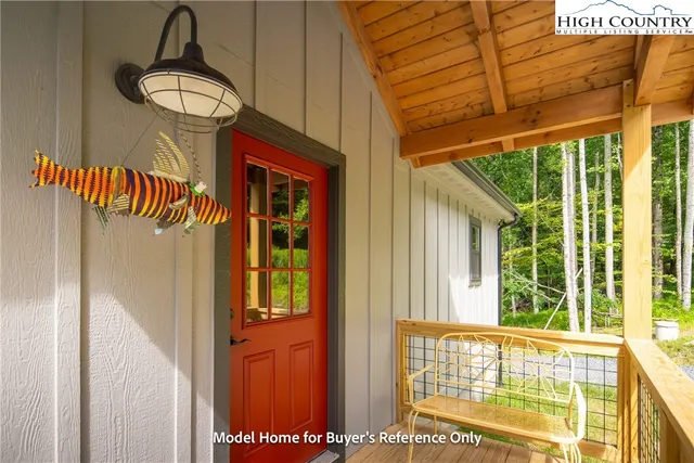 a bathroom with a mirror and a window