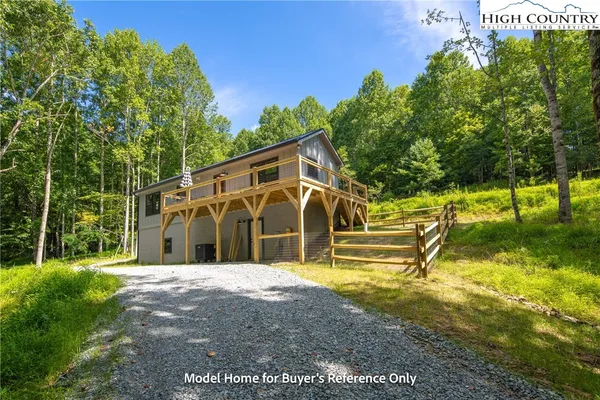a view of a house with swimming pool