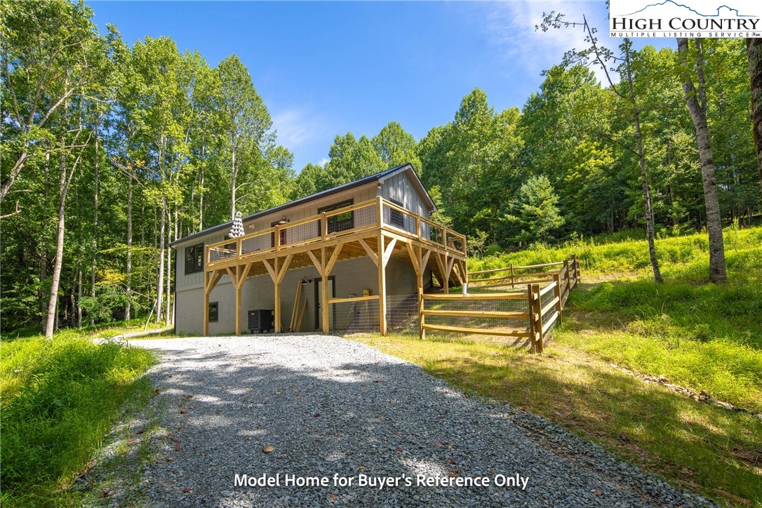 490 Laurelwood Lane Boone, NC 28607 - Photo 29 of 50 a view of a house with swimming pool