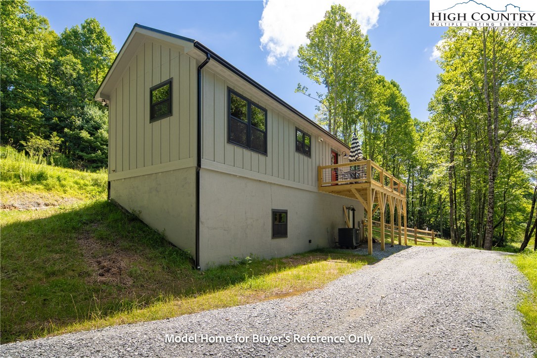 490 Laurelwood Lane Boone, NC 28607 - Photo 30 of 50 a view of a back yard of the house