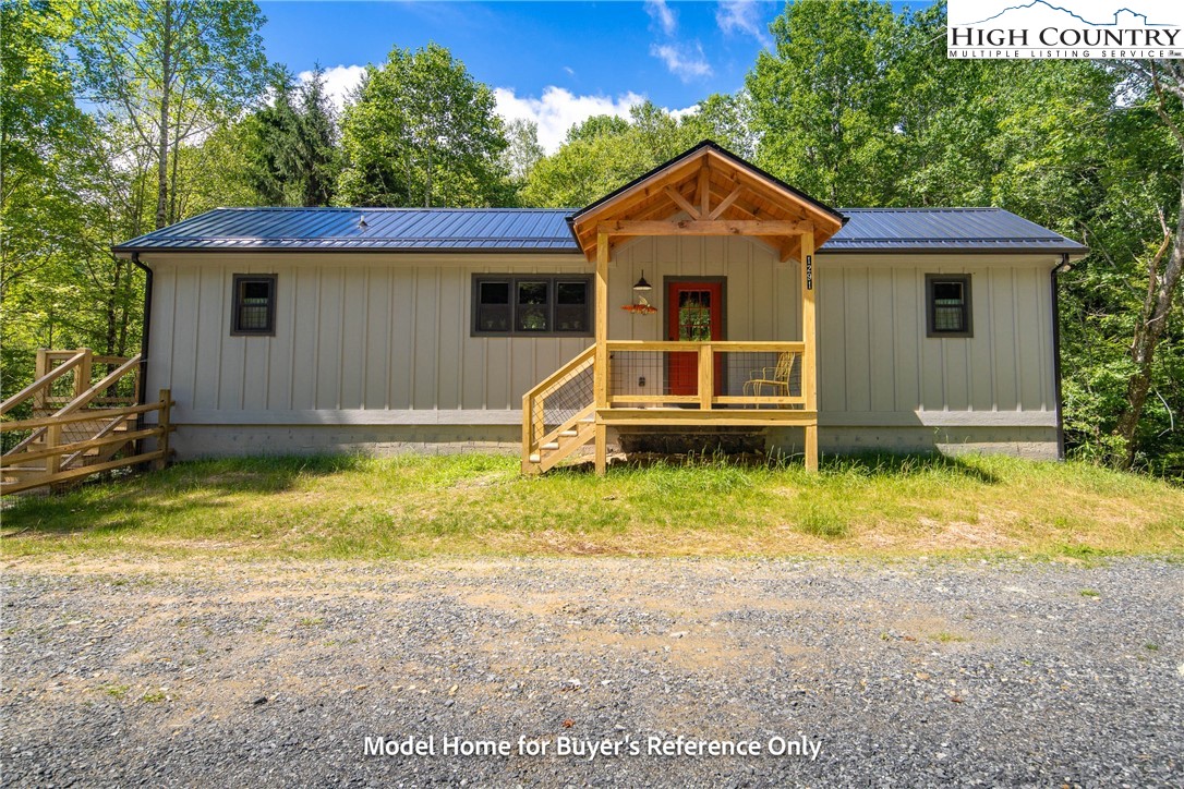 490 Laurelwood Lane Boone, NC 28607 - Photo 32 of 50 a front view of a house with a yard