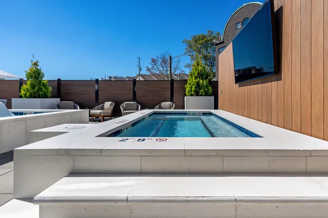 a view of kitchen with cabinets and potted plant