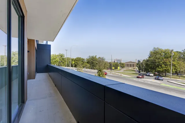 a tall building on the side of a street