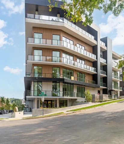 a front view of a building with street view