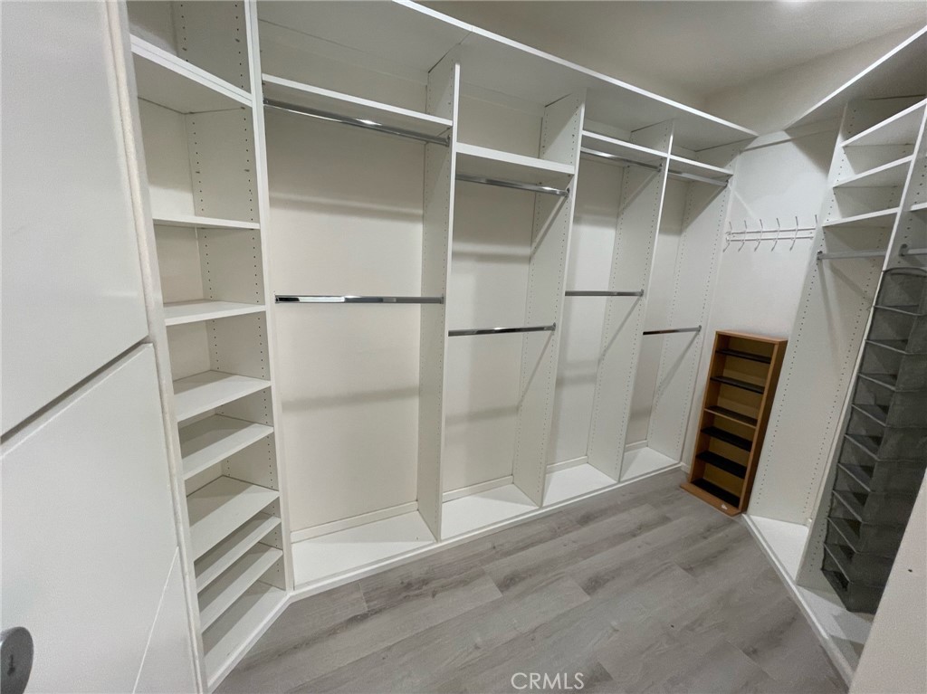35330 Rosemont Drive Palm Desert, CA 92211 - Photo 13 of 38 a view of walk in closet with empty racks