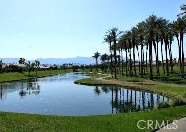 a view of a lake with a big yard
